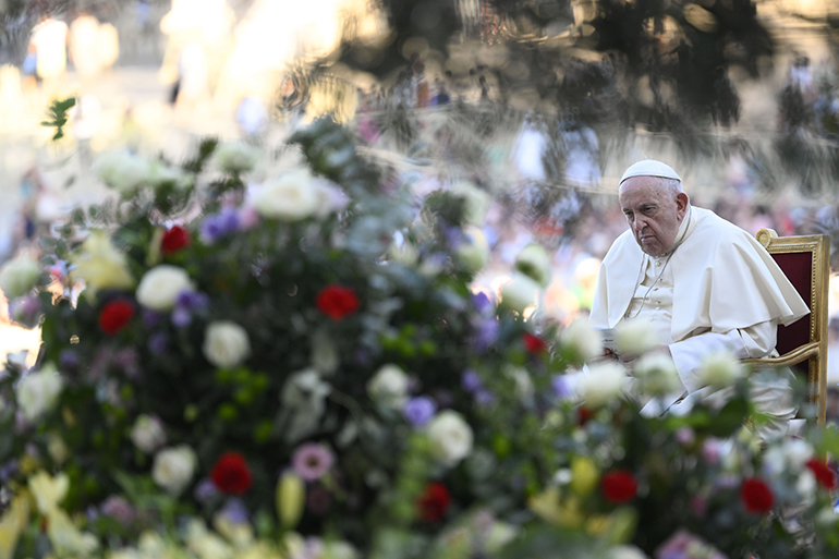 Pope Francis listens during an ecumenical prayer vigil before the assembly of the Synod of Bishops in St. Peter's Square at the Vatican Sept. 30, 2023. (CNS photo/Vatican Media)