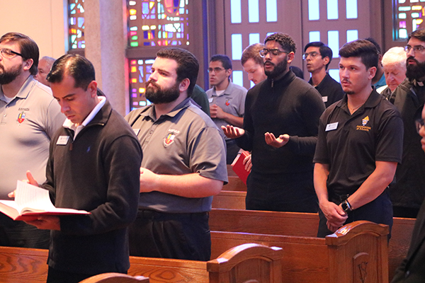 Seminarians at St. Vincent de Paul Regional Seminary join in prayers during the Mass celebrating the seminary's 60th anniversary, Sept. 27, 2023.