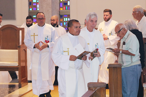 Alumni from dioceses throughout Florida returned to St. Vincent de Paul Regional Seminary, where they received their formation, to attend its 60th anniversary Mass, Sept. 27, 2023. Pictured from left: Miami priests Father Yosbany Alfonso, Father Elvis Gonzalez and Father Michael Greer.