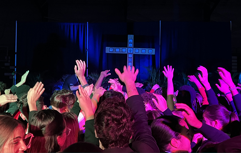 Catholic high school students react to the words and music of Catholic speaker and recording artist Joe Melendrez at the Rise Up event at the St. Thomas University Fernandez Family Center, Oct. 5, 2023. Melendrez also was the keynote speaker at the event.