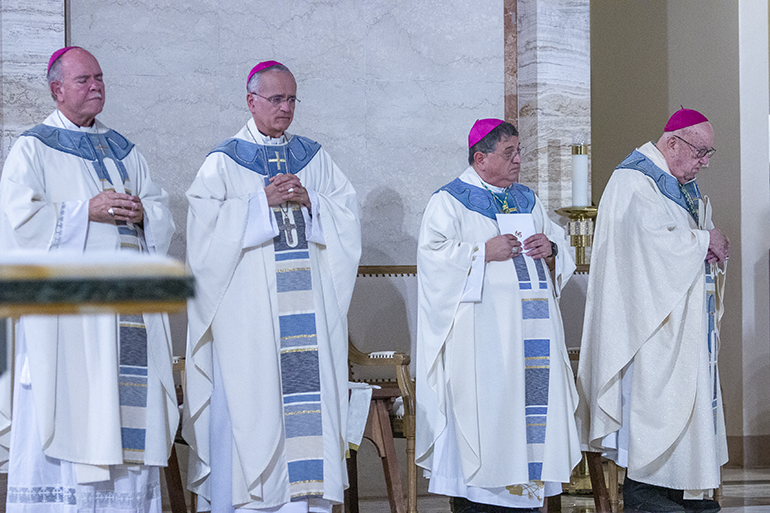 Bishops taking part in the Mass for the 65th anniversary of the establishment of the Archdiocese of Miami, Oct. 7, 2023, at St. Mary Cathedral, from left: Bishop Fernando Isern, emeritus of Pueblo, Colorado; Bishop Silvio Baez, auxiliary bishop of Managua, Nicaragua; Bishop Enrique Delgado, auxiliary bishop of Miami; and Archbishop John C. Favalora, Miami's third archbishop.