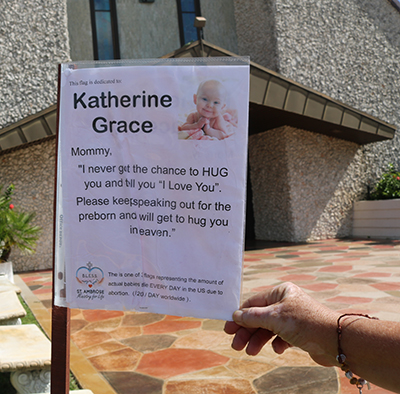 As part of a Respect Life Month project by the parish's BLESS Ministry for Life, memorials were set up at St. Ambrose Church in Deerfield Beach dedicated to babies who have died because of abortion procedures. Katherine Grace is the baby of Carol Foster, who founded the ministry.