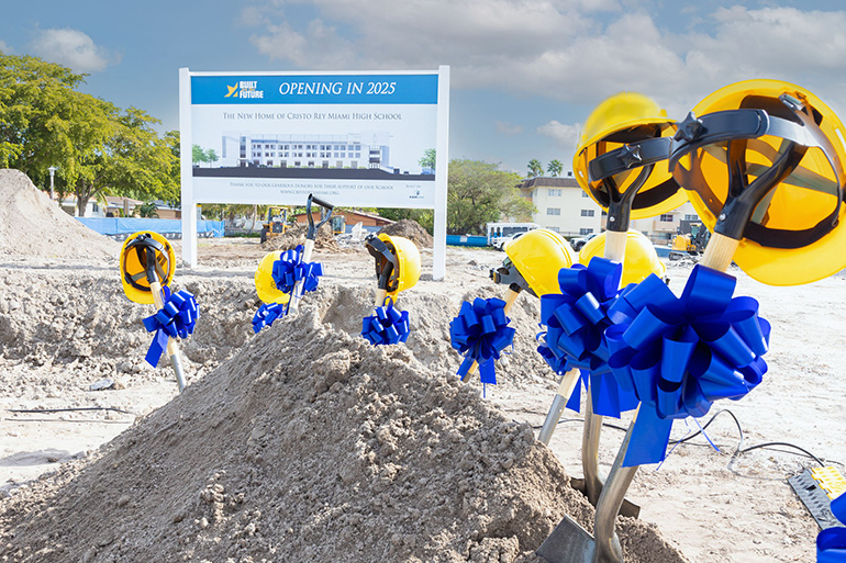 Festooned shovels mark the spot where Cristo Rey Miami High School broke ground for its new 38,000-square-foot academic building, located at 125 N.E. 119 St. in North Miami. The groundbreaking took place Nov. 30, 2023 and the building should be ready for occupancy in 2025.