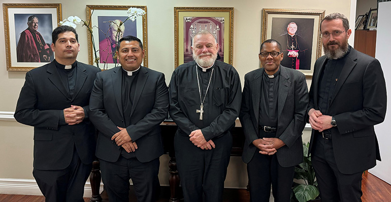 Several priests from other dioceses and religious communities who have been working in South Florida for a number of years were officially incardinated - that is, made part of - the Archdiocese of Miami on Dec. 12, 2023. Here they are posing with Archbishop Thomas Wenski (center); from left: Father Warren Escalona, currently parochial vicar at St. Henry in Pompano Beach; Father Antonio Tupiza, currently parochial vicar at Our Lady of Guadalupe in Doral; Father Jean Sterling Laurent, currently chaplain at Mercy Hospital and in residence at St. Kieran in Miami; and Father Andrzej Foltyn, currently parochial vicar at St. Agnes in Key Biscayne.