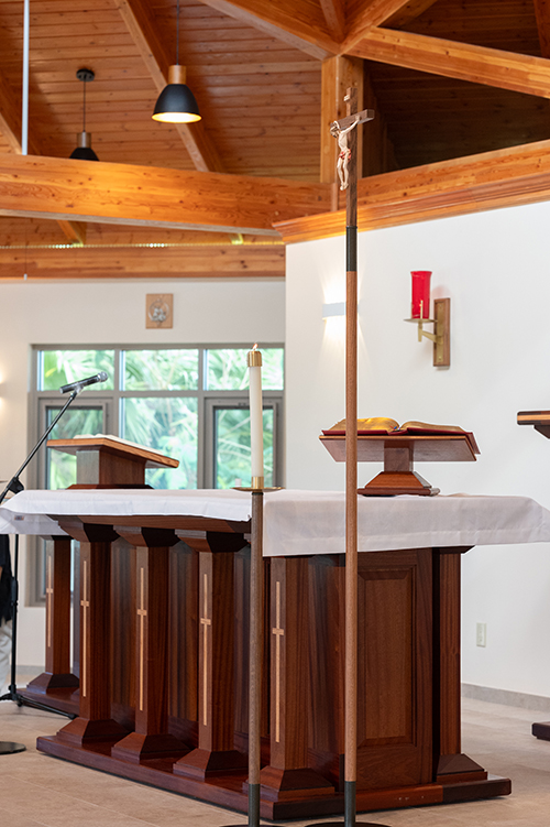 View of the altar at the newly rebuilt and dedicated Sts. Mary and Andrew Catholic Church in Treasure Cay, Abaco, the Bahamas, which features an open air design and wood appointments. The church was designed by a Miami architect and made possible in part by the financial support of donors in Florida and the United States through a Hurricane Dorian special collection in 2019.