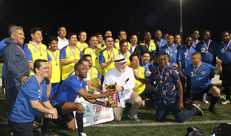 Archbishop Thomas Wenski poses with the priest of Miami and Quito, Ecuador, after the soccer match, the Clericus Cup, between both Archdioceses, which was held for the first time on April 23, 2024, on the field of St. Thomas University, in Miami Gardens. The priest of Miami bet the priest of Qiuito 3-2. (ROCIO GRANADOS | LVC)