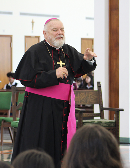 Archbishop Thomas Wenski provides the keynote to students attending the Focus 11 vocations rally in St. John Vianney College Seminary May 21, 2024.