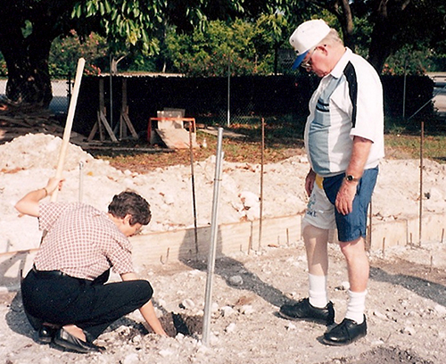 File photo of Anne Gardner and Msgr. Patrick McDonnell, former pastor of St. Sebastian Parish in Fort Lauderdale, at the site where a parish hall was built in 1995.