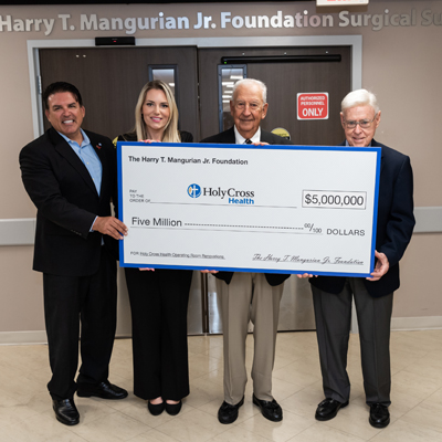 The Harry T. Mangurian Jr. Foundation donated  million to Holy Cross Health in Fort Lauderdale, which helped renovate the surgical suites of the hospital, now named after the donor. From left to right in the photo are Mark Doyle, president and CEO of Holy Cross Health, and Laura Denoux, vice president and Chief Development Officer, joined by Steve Mehallis, president of The Harry T. Mangurian Jr. Foundation and Gordon Latz, vice president.