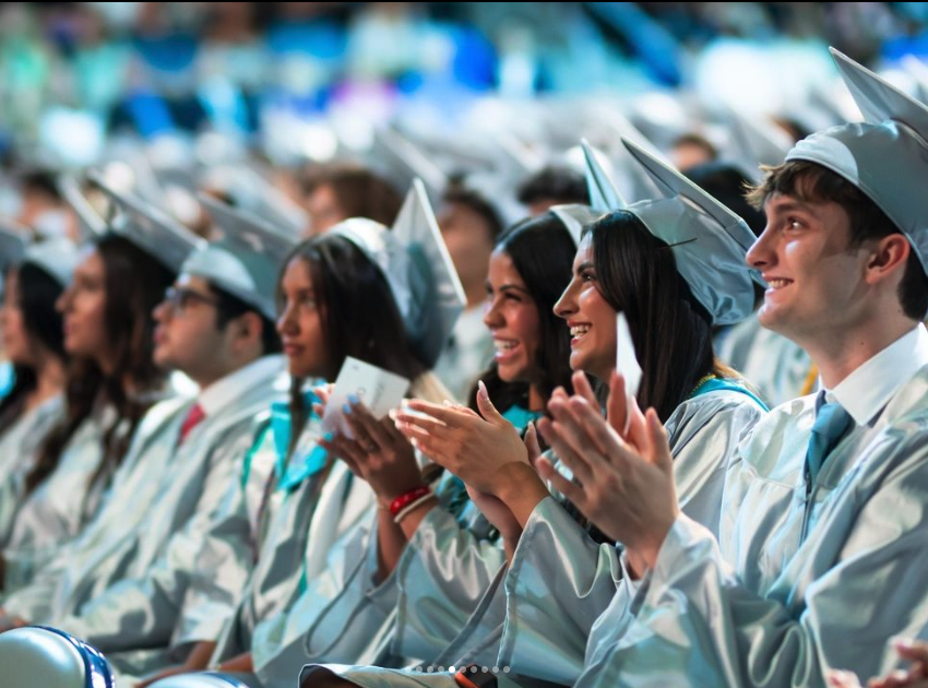 Members of Archbishop McCarthy High School's class of 2024 applaud during their graduation, May 24, 2024. "A class so resilient that not even a pandemic could slow them down," states the school's Instagram post - something that applies to the nearly 3,000 high school graduates in the Archdiocese of Miami.