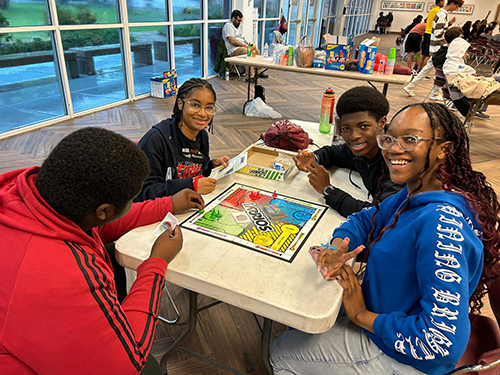 Campers of STU Impact enjoy a few board games. A total of 54 students from Catholic and public high schools participated in this year's camp focusing on fellowship and formation in the faith.