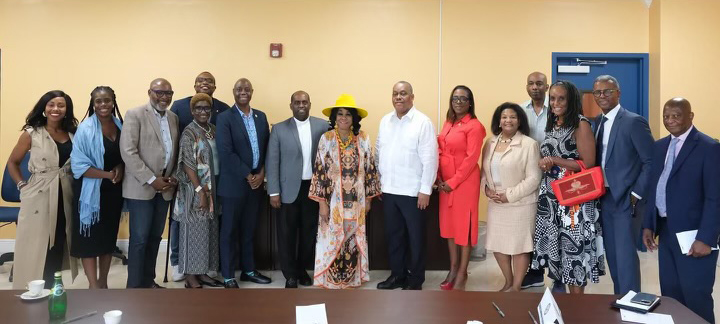 Haitian new Prime Minister Garry Conille (white shirt in center) met with Father Reginald Jean-Mary, pastor of Notre Dame D'Haiti Mission in Miami, and Haitian American leaders June 29,2024, at the Mission in Miami's Little Haiti neighborhood.