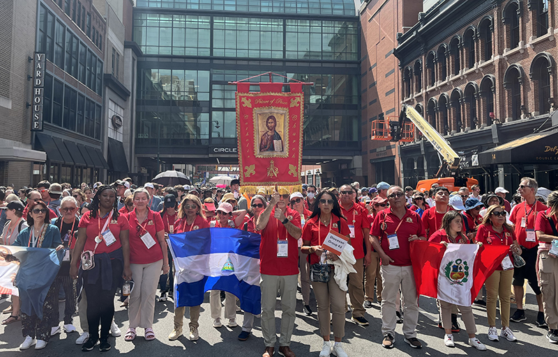 A large delegation from the Archdiocese of Miami participated in the Eucharistic procession through the streets of Indianapolis on July 20, 2024, and the nearly 50 participants from Prince of Peace Church led the way, carrying flags representing their ministries and countries of origin, including Mexico, Peru and Nicaragua. The National Eucharistic Congress was held July 17-21, 2024, in Indianapolis, Indiana.