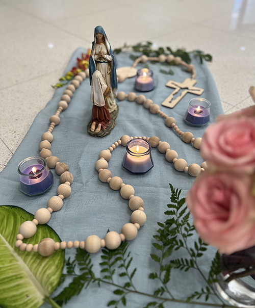 This statue of Our Lady of Lourdes was placed front and center during the Saturday, July 27, 2024, SoulCore class at the St. Louis Parish Family Center. The SoulCore movement involves praying the rosary while engaging in light exercises designed to promote contemplation.