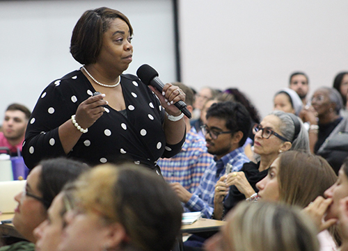 Latonya White, associate superintendent for teaching and learning in the Office of Catholic Schools for the Archdiocese of Miami, speaks to more than 240 new teachers as they gather for orientation at Monsignor Edward Pace High School in Miami Gardens Aug. 5, 2024.