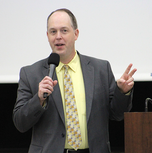 Jim Rigg, superintendent of Catholic schools for the Archdiocese of Miami, speaks during an orientation for more than 240 new teachers who gathered at Monsignor Edward Pace High School in Miami Gardens Aug. 5 for orientation.