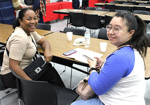 New teachers listen as Donald Edwards, associate superintendent of schools for the Archdiocese of Miami, leads a session on relationships between teachers and parents and students. More than 240 new teachers gathered at Monsignor Edward Pace High School in Miami Gardens Aug. 5 for orientation.