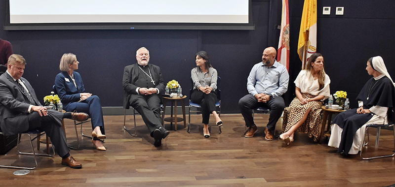 A panel discussion consisting of five panelists met at St. Thomas University on September 26, 2024, to discuss Florida's proposed Amendment 4. From left, are the two moderators, Scott Gale, chair of political science at STU, and Ashlee Rzyczycki, Faculty Senate chair in the STU College of Business; Archbishop Thomas Wenski of Miami; Dr. Grazie Pozo Christie of The Catholic Association; John and Christine Mora; and Sister Ann Immaculee, a member of the Sisters of Life.