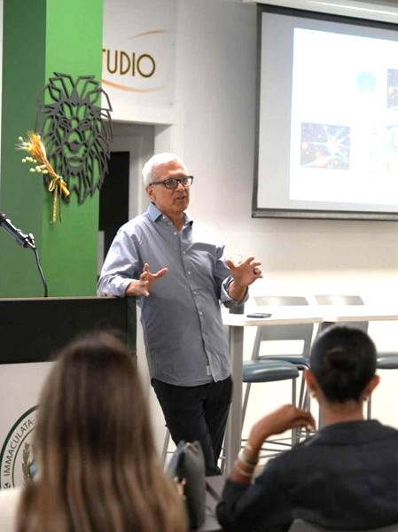 Carl Wilkens, who experienced the 1994 genocide in Rwanda, speaks to students from Immaculata La Salle High School. Wilkens visited in April 2024.