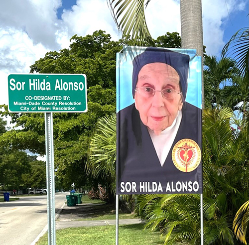 The Sister Hilda Alonso Street sign was unveiled Sept. 9, 2024. It can be seen, along with a banner of her photo, on a portion of Tamiami Canal Road and Northwest 63rd Avenue in Miami, near the convent of the Daughters of Charity of St. Vincent de Paul.