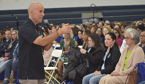 Rob Longo, CEO of the Boston-based Live Vertical ministry, urges listeners to listen to the inner voice of Jesus during the annual archdiocesan Catechetical Conference, which brought more than 700 religious education and Catholic school teachers to Epiphany Church and Our Lady of Lourdes Academy in Miami, Oct. 19, 2024.