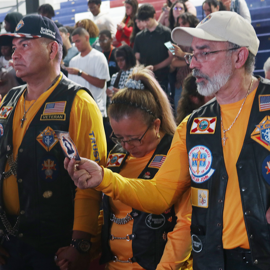 Members of the Knights on Bikes, part of the Knights of Columbus, pray the “Prayer for Our Nation” to the Immaculate Conception for the United States, during the Pro-life rally against Amendment 4 event at St. Thomas University, Sept. 27, 2024.