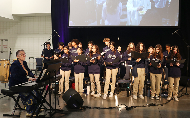 The St. Thomas Aquinas High School Choir, led by its director, Wanda Drowdovitch, sings during the Professional Development Day Mass Sept. 27,2024 at the Broward Convention Center in Fort Lauderdale.