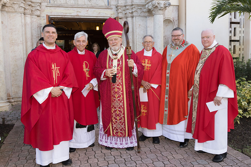 Miami Archbishop Thomas Wenski with local clergy after the  the 32nd annual Red Mass, Reception and Dinner hosted by the St. Thomas More Society of South Florida, in Broward County.