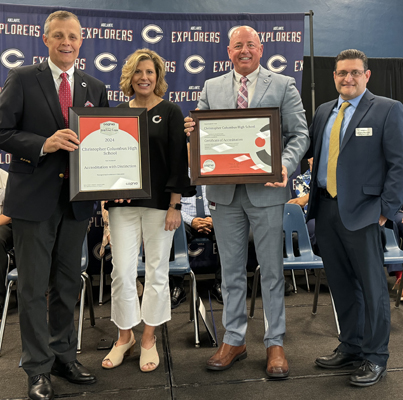 Christopher Columbus High School has been named a 2024 Cognia School of Distinction. On October 16, 2024, Cognia representatives recognize the achievement. Pictured here (left to right) are Columbus High President Thomas Kruczek, Cognia's Senior Director Dianna Weinbaum, Columbus Principal David Pugh, and Cognia's Senior Director of the U.S. Southeast Andy Martinez.