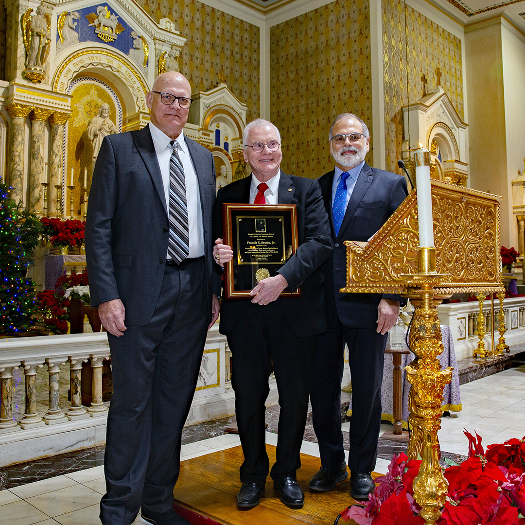 Left to Right, 2023 Lex Christi, Les Amoris award recipient Federal Magistrate Judge John O'Sullivan, Francis X. Sexton Jr., this year's award recipient, and Miami Catholic Lawyers Guild president Raoul Cantero pose for a photo.
Archbishop Thomas Wenski celebrated the annual Red Mass at Gesu Church of Miami on Dec. 11, 2024.