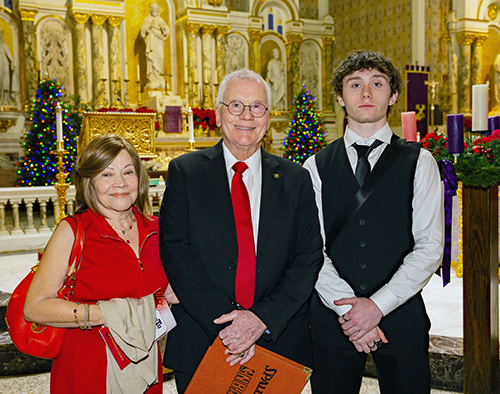 The 2024 Lex Christi, Lex Amoris award recipient Francis X. Sexton Jr. poses for a photo with his wife, Maria Teresa Zuniga, and grandson, Derek Sexton, 17.
Archbishop Thomas Wenski celebrated the annual Red Mass at Gesu Church of Miami on Dec. 11, 2024.