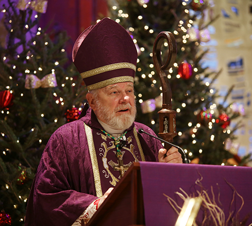 Archbishop Thomas Wenski preaches the homily during the annual Christmas Mass, followed by employee recognition luncheon, with Pastoral Center staff, celebrated Dec. 20, 2024, at St. Martha Parish in Miami Shores.