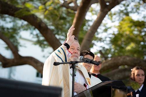 Archbishop Thomas Wenski blesses the new Basilica High School building and facilities at the Basilica of St. Mary Star of the Sea Parish and School in Key West Dec. 13, 2024, which had been closed decades before and was reopened in a newly renovated building that had served as a community theater.