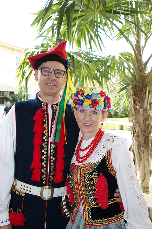 Ireneusz and Ewa Otfinowski of Our Lady of Czestochowa Mission in Pompano Beach share their Polish heritage at the Migration Mass held on Jan. 5. 2025 at St. Mary Cathedral of Miami.