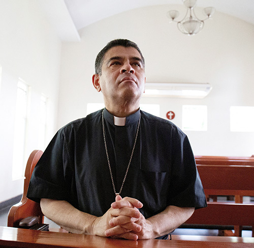 Bishop Rolando Álvarez of Matagalpa, Nicaragua, a frequent critic of Nicaraguan President Daniel Ortega, prays at a Catholic church in Managua May 20, 2022. He gave his first interview since being exiled to the Vatican in January 2024, and it came amid another cancellation of the legal status of a Catholic organization as the Sandinista regime effectively extinguishes civil society groups and religious orders.