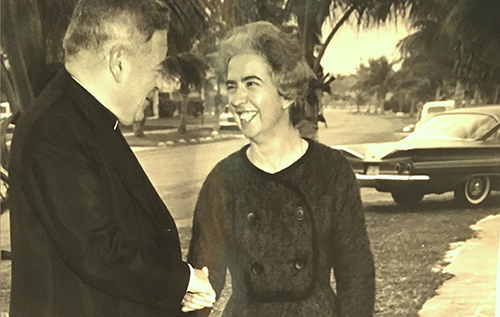 In this 1961 photo, Maria Teresa Barrenechea, international vice president of the Teresian Association, greets Bishop Coleman F. Carroll. That year, Bishop Carroll established a house for Teresian members in Coral Gables.