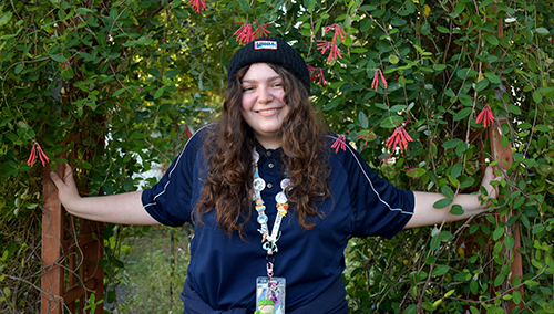 Chayce Israel, an 11th grader at St. Thomas Aquinas High School, tends the school garden during Sister John Norton STEAMS Competition Jan. 25, 2025 at St. Thomas Aquinas High School in Fort Lauderdale.