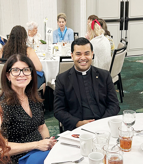 Principal Kristen Whiting of All Saints School in Sunrise and Father Yamil Miranda, pastor of All Saints Church, attend the MACCW Scholarship Fund luncheon on Feb. 22, 2025 at the Embassy Suites Hotel Fort Lauderdale.