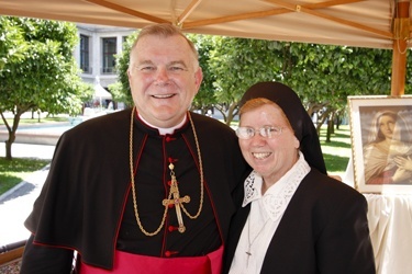 Sister Elizabeth Worley is shown here posing with Archbishop Thomas Wenski after he received his pallium in Rome.