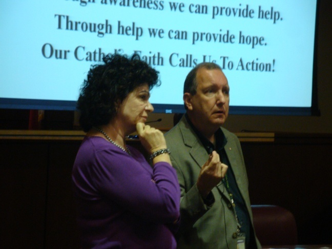 Mary Ross Agosta, director of communications for the Archdiocese of Miami, and Tom Gillan, of Catholic Charities of Central Florida, take questions on the roll-out early next year of the parish communication plans for human trafficking awareness.