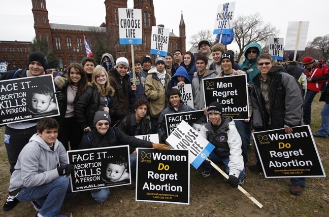 Students from archdiocesan high schools pose for a group shot on the National Mall during the March for Life rally.