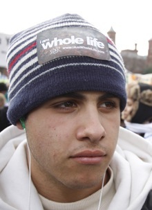 Jordan Portal, 17, of Christopher Columbus High School takes part in his first March for Life.