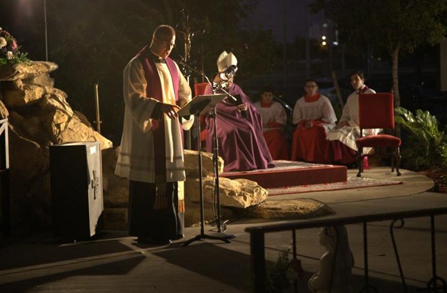 Father Chris Marino, pastor of St. Michael Parish in Miami, delivers a reflection during the solemn vespers service that began the Year for Priests celebration.