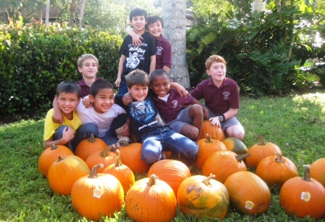 St. Andrew Catholic School second graders have fun at the pumpkin patch while raising money for their school. Bottom row, from left to right: Biaggi Tucci, Gio D'Auria, Joshua Alfaro, Sean Suarez, and Justin Land. Top row, left to right: Tyler Dean, Christopher Trokey, and Jonathan Hoffer