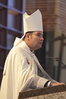 Choirbishop Michael Thomas of the Eparchy of St. Maron of Brooklyn preaches the homily at the funeral Mass for Anthony Abraham. Choirbishop Thomas previously served as pastor of Our Lady of Lebanon Maronite Catholic Church in Miami where Abraham attended and did much to support its growth.