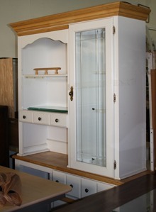 Cabinets in good condition fill the aisles of the St. Vincent de Paul Society's thrift shop in Hialeah.