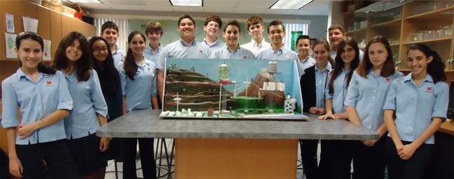 St. John Neumann's sustainable city developers, from left to right: Amanda Bello, Kristen Zagales, Michelle Accad, Connor Gonzalez, Micaela Chiang, John Cook, Mario Sanchez, Stephen Bezold, Nicolas Zinobile, Alex Tercilla, Gabriel Seiglie, Adrian Hernandez, Paula Longoria, Ryan Sanchez, Alexis Kmieck, Alexandra Daly, and Madison Fernandez.