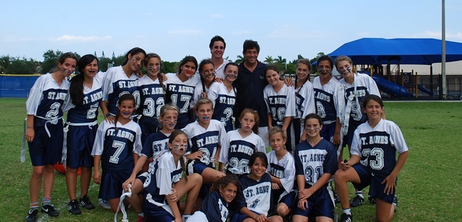 The girls varsity flag football team of St. Agnes Academy on Key Biscayne, pictured here, went undefeated this season and wound up champions of their division.