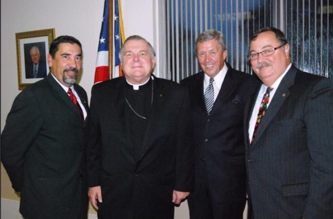 Archdiocesean Catholic Committee on Scouting Chairman AJ Naranjo, Archbishop Thomas Wenski, Boy Scout Council President Robert Morrison, Boy Scout Council Executive John Anthony.