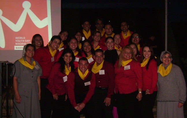 The archdiocesan group going to World Youth Day in Madrid this August poses for a photo earlier this year after a Spanish Night celebration in preparation for their trip. The Claretian Missionaries leading them are Sister Olga Villar, left, and Sister Ondina Cortes, right.